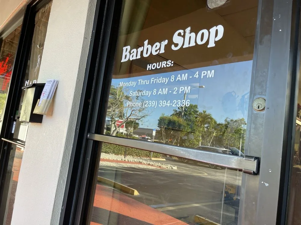 Shop door with posted hours